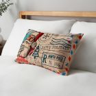 Father Christmas Letter Cushion, Beige on bed on bed
