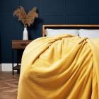 Jumbo Snugglie Fleece Throw, Ochre Styled on Bed
