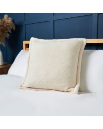 Boucle Cushion with Flange Edge, Cream Styled on Bed