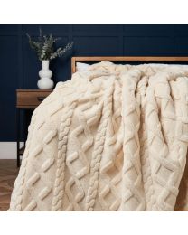 Cable Knit Throw with Sherpa Backing, Cream Styled on Bed