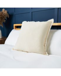 Cotton Cushion with Frayed Edge, Cream Styled on Bed