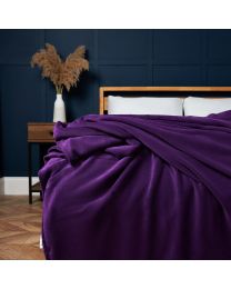 Jumbo Snugglie Fleece Throw, Plum Styled on Bed