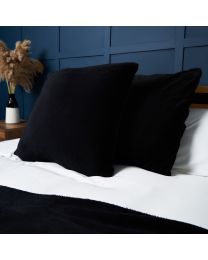 Large Microfleece Cushion, Black Styled on Bed
