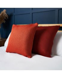 Snow Fleece Cushion, Orange Styled on Bed